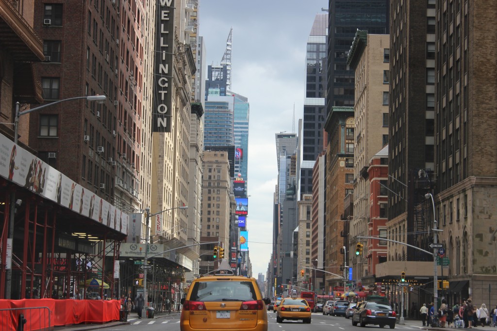 Yellow taxis moving fast in the streets on New York City.