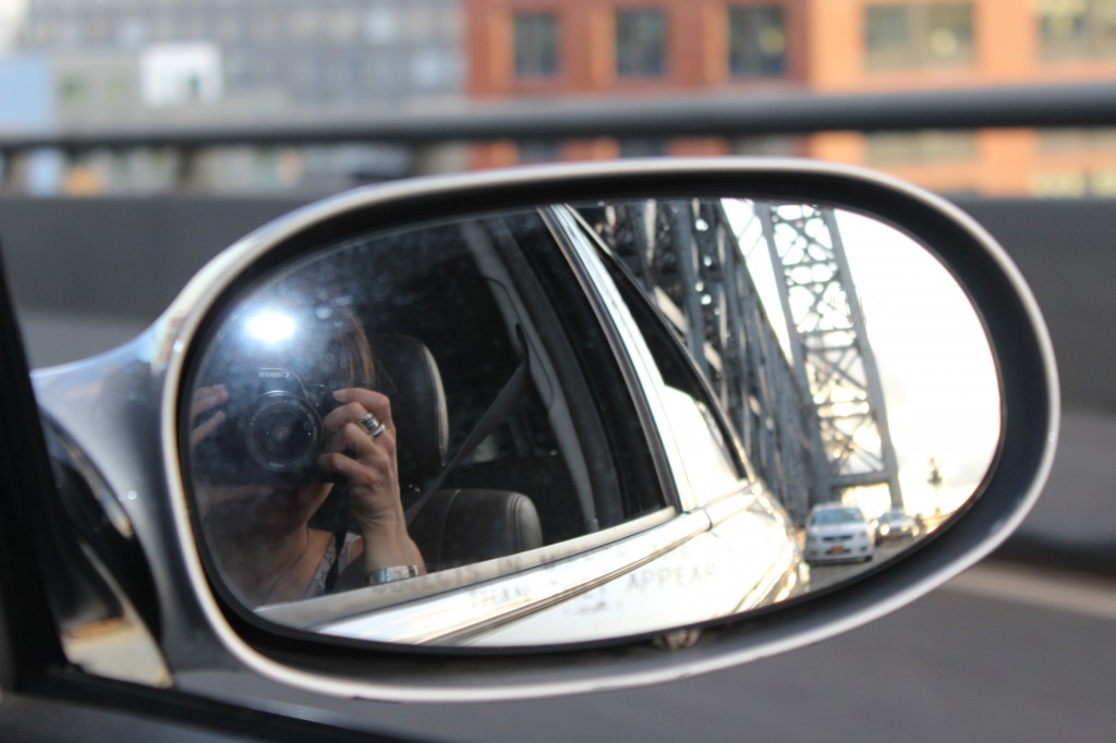 Driving over on of the bridges into Manhattan from Brooklyn into the city.